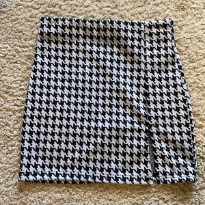 Brand new plaid mini skirt. Selling because too small